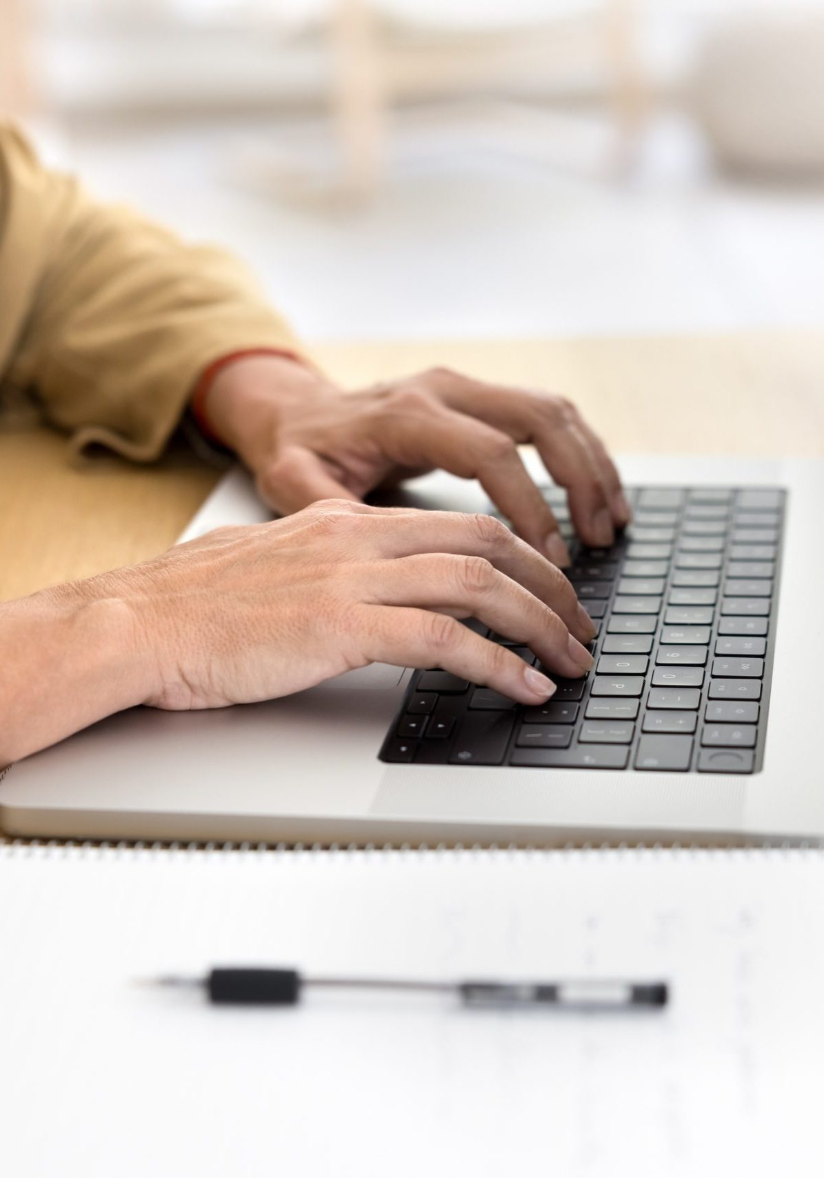 Hands,Of,Senior,Woman,In,Casual,Typing,On,Laptop,Keyboard,